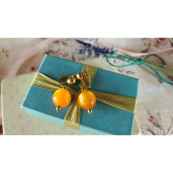 Celebrity Orange Dangling Clip-on Earrings - Picture 3 of 10